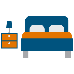 Side table with lamp and bed